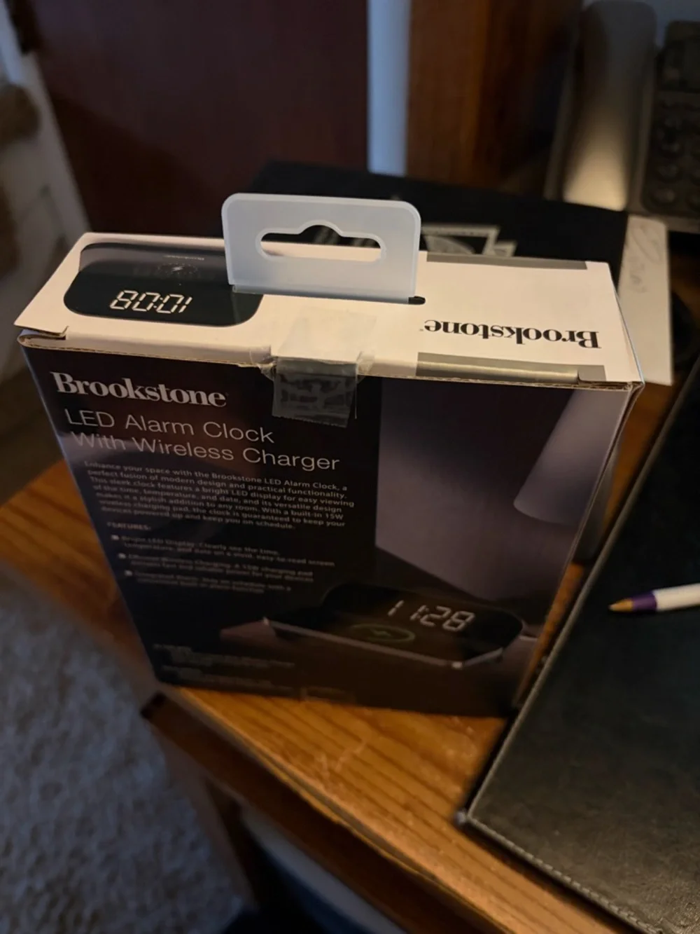 Brookstone Black LED Alarm Clock with Wireless Charging Pad